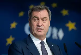 N é m e t o r s z á g n a k   e l f o g y o t t   a   t ü r e l m e .   S ö d e r   a z   i d e g e n   d r ó n o k   l e l ö v é s é t   k ö v e t e l i   k r i t i k u s   h e l y e k   f e l e t t