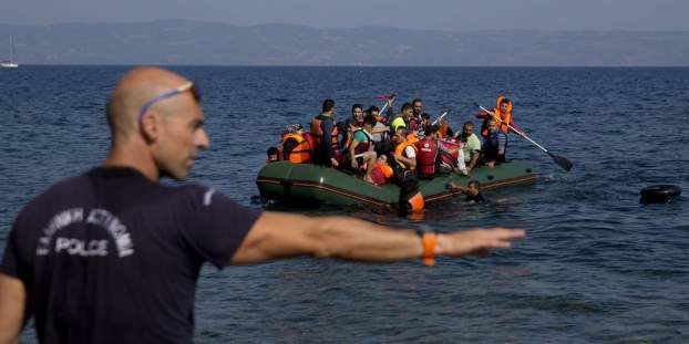 201707281501240.635-Greece-Migrants.jpg