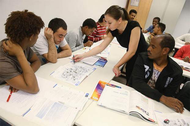 201709141221560.migrants-learn-7654.jpg