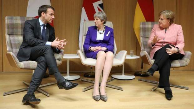 201803231615360.angela-merkel-theresa-may_.jpg